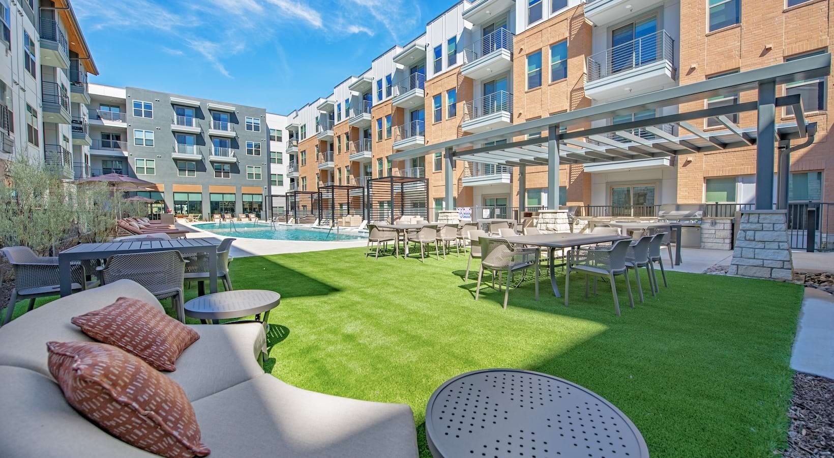 Courtyard lawn with lounge seating