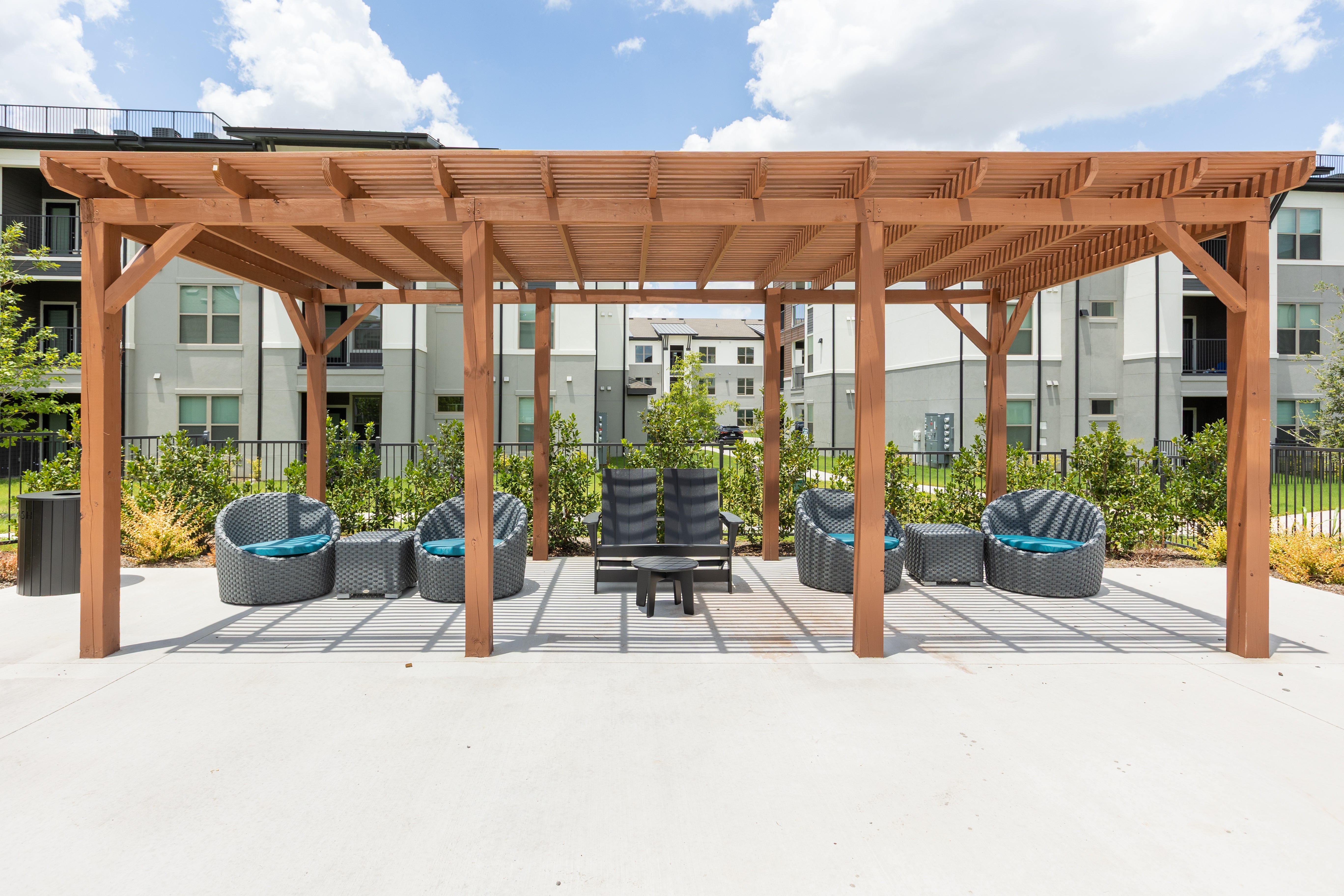 Pergola with hanging chairs