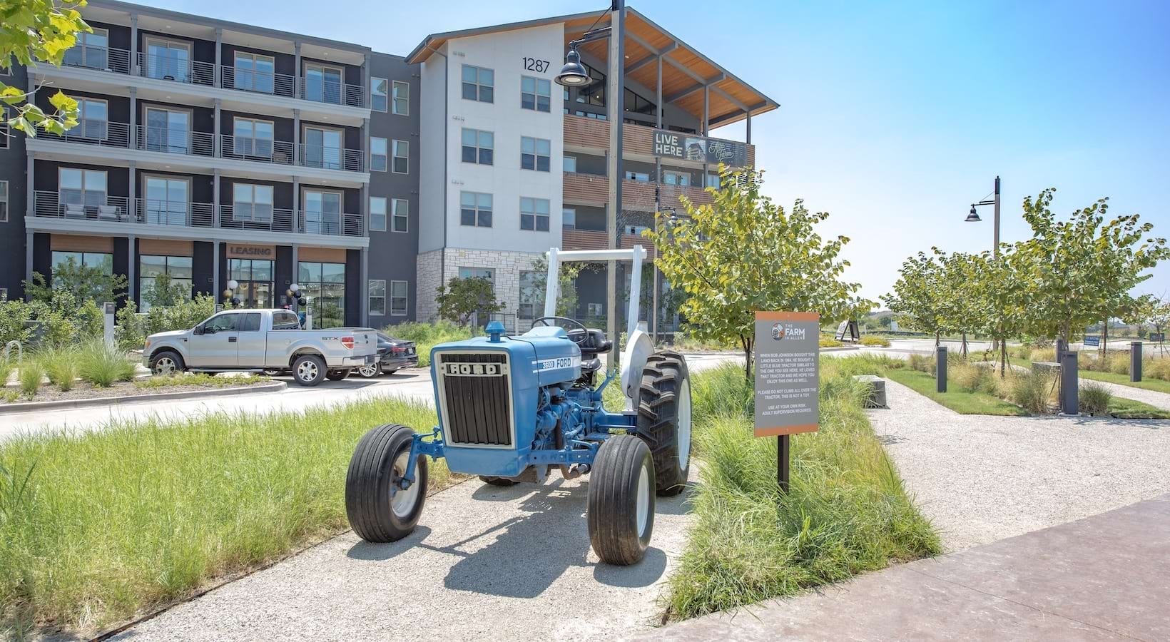 Landscaped grounds with tractor feature