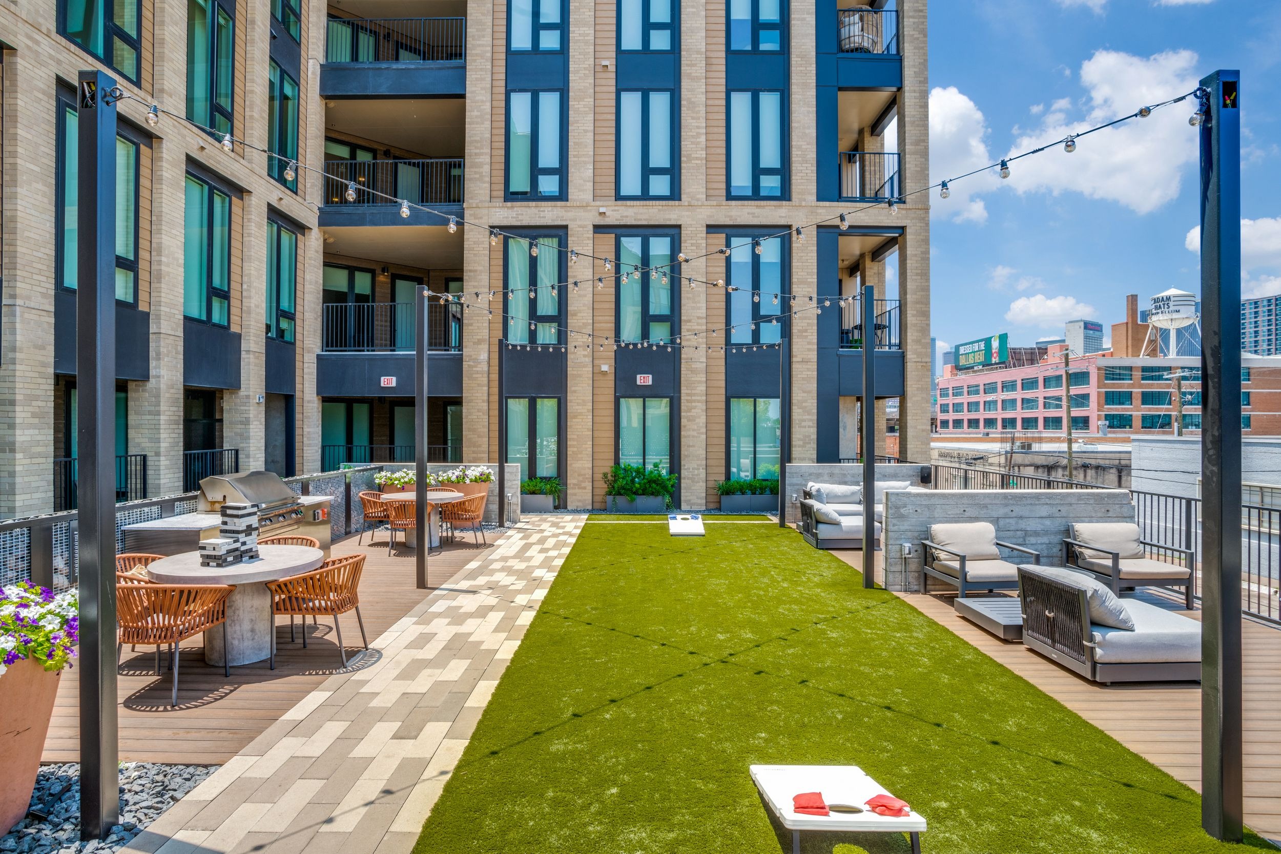 Outdoor lounge with games and grill