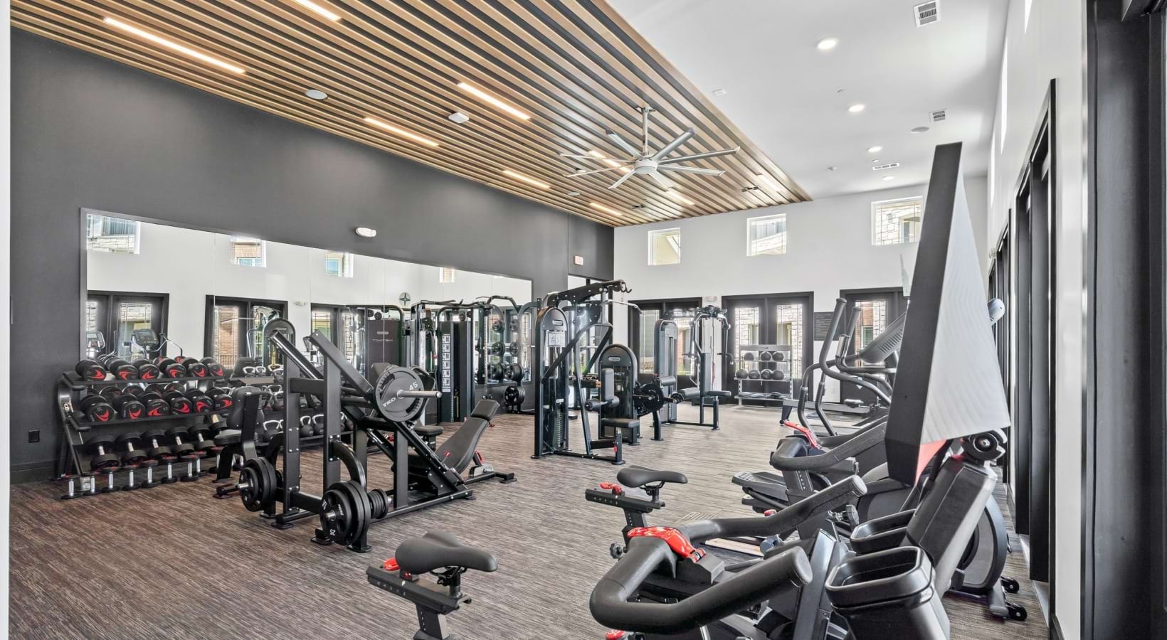 Fitness lounge with cardio and strength equipment