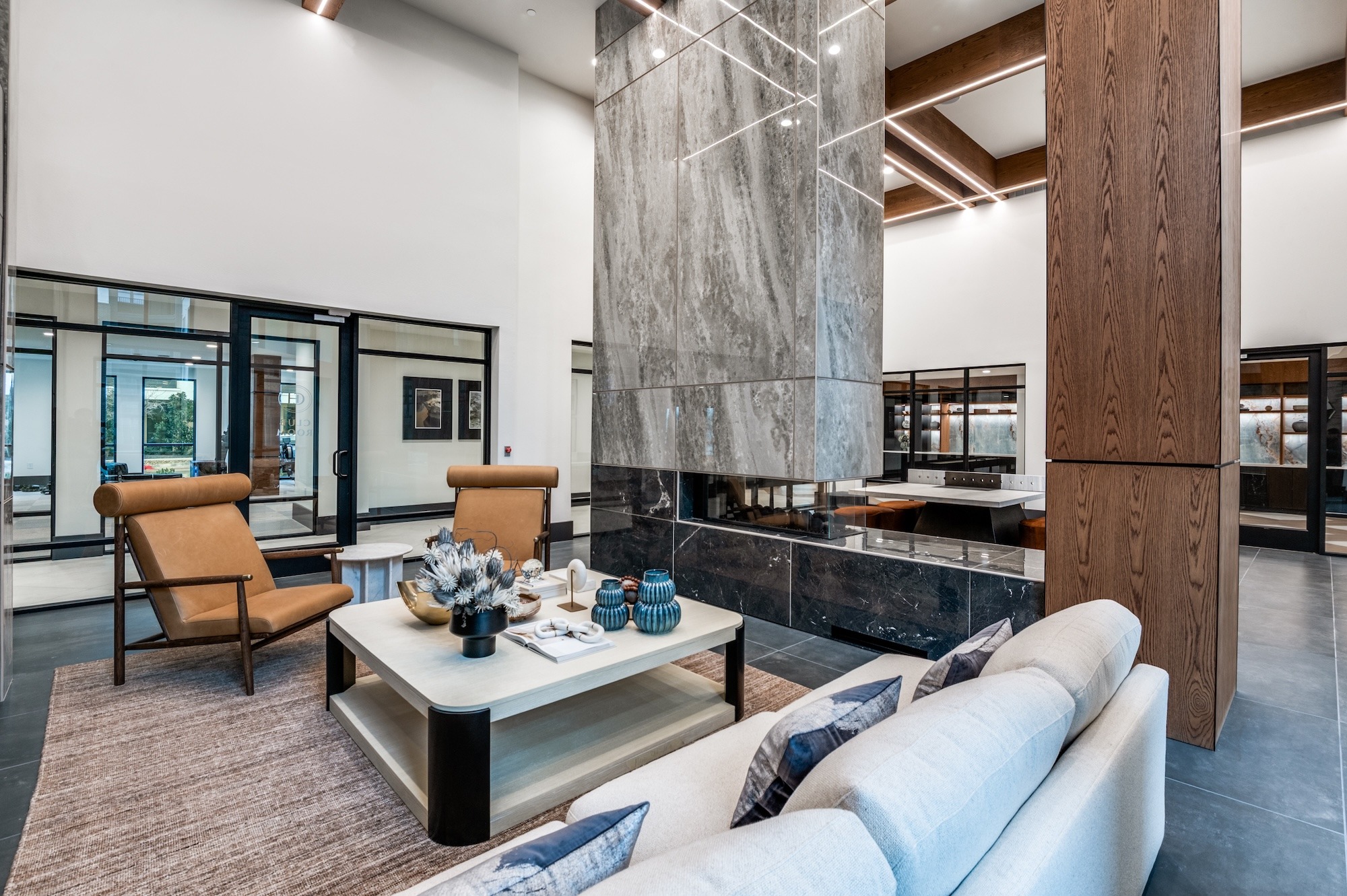 Lounge seating beside the marble fireplace