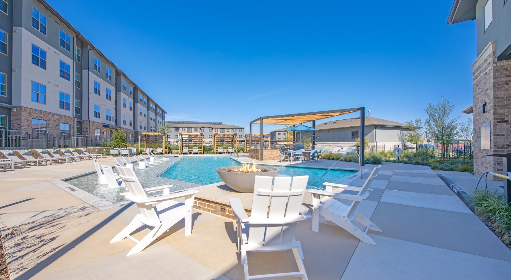 Pool with sun loungers