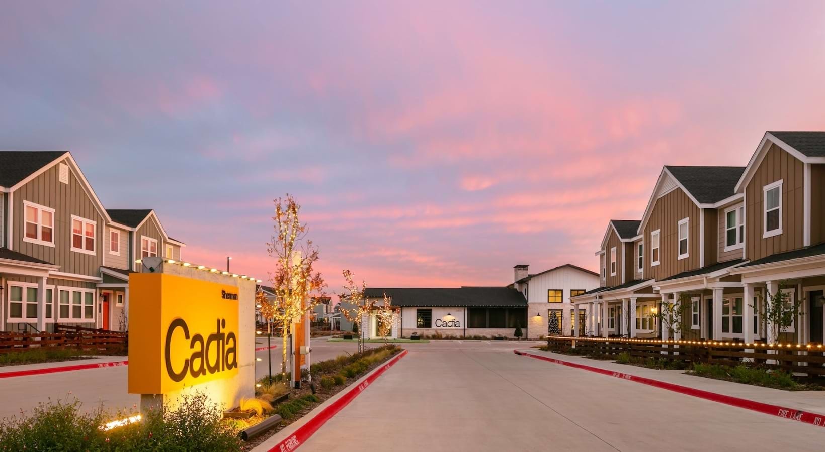 Community entrance at dusk