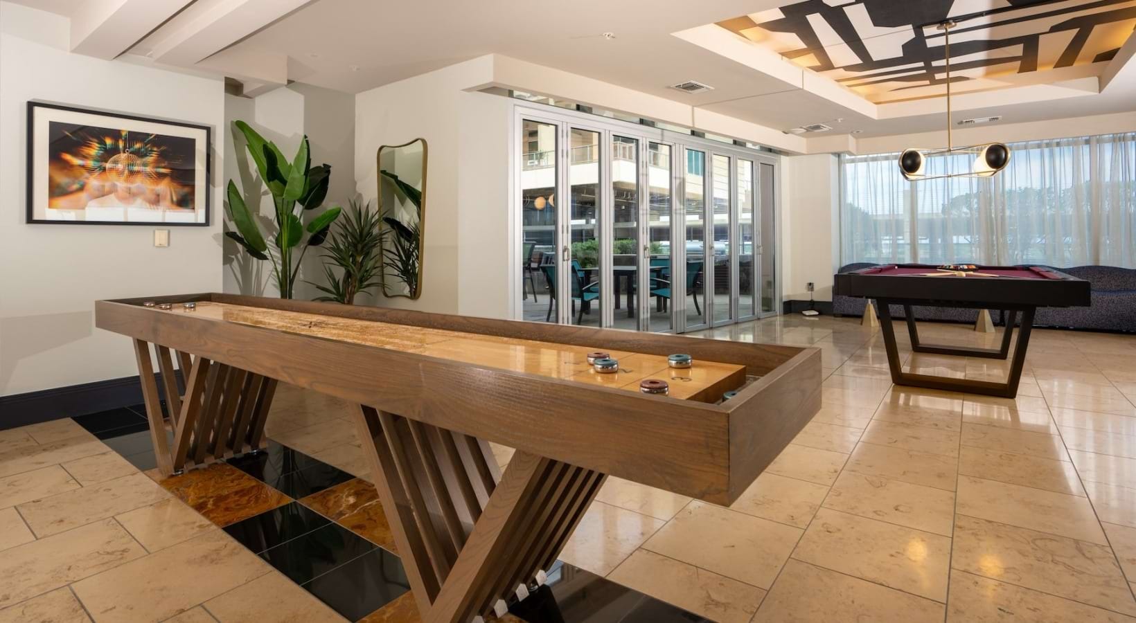 Aqua Lounge with shuffleboard and billiards