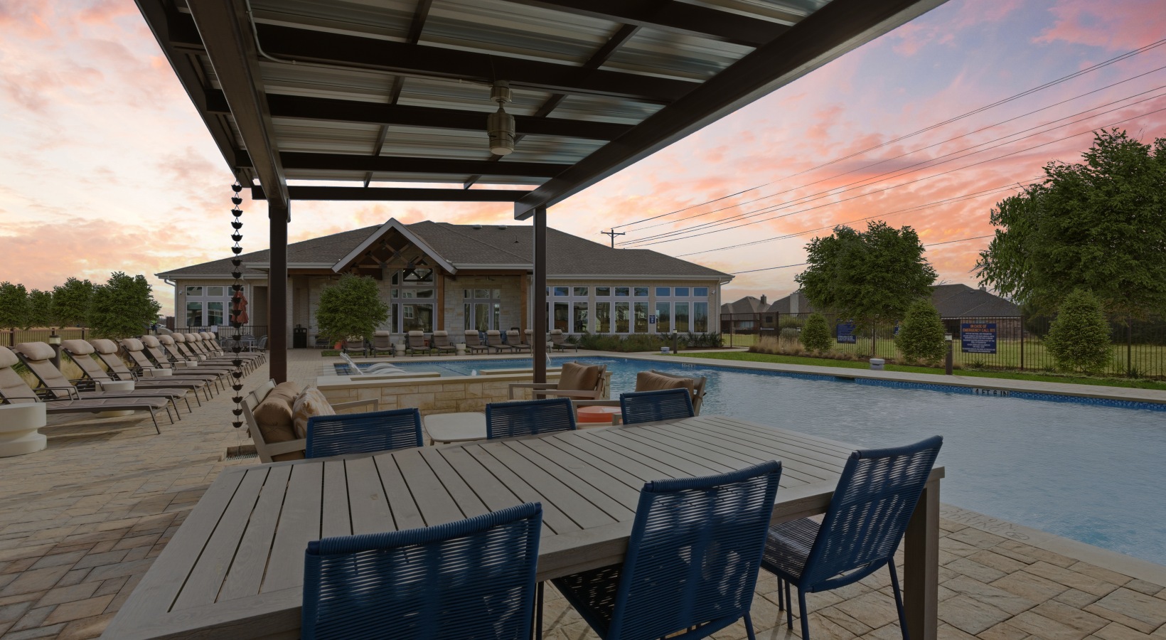 Covered patio alongside the pool