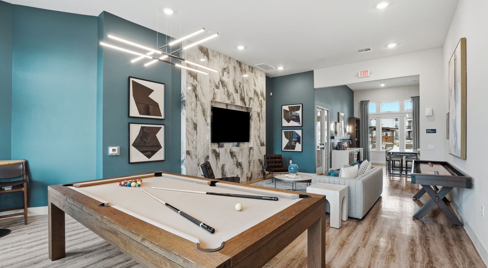 Game room with pool table and shuffleboard