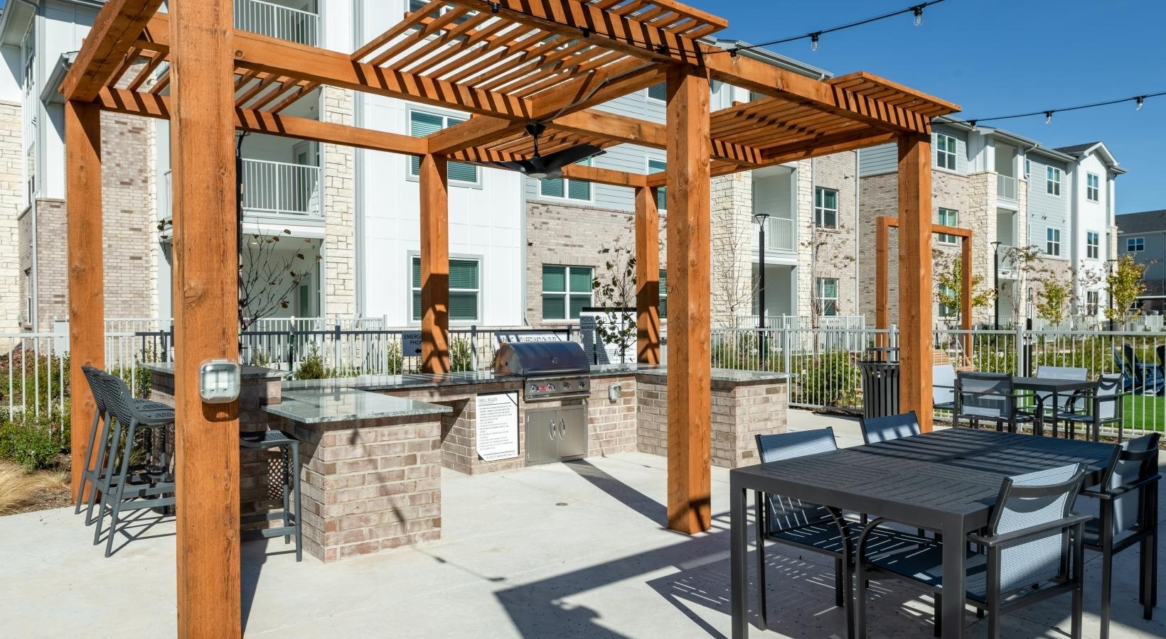 Outdoor grilling stations and covered dining