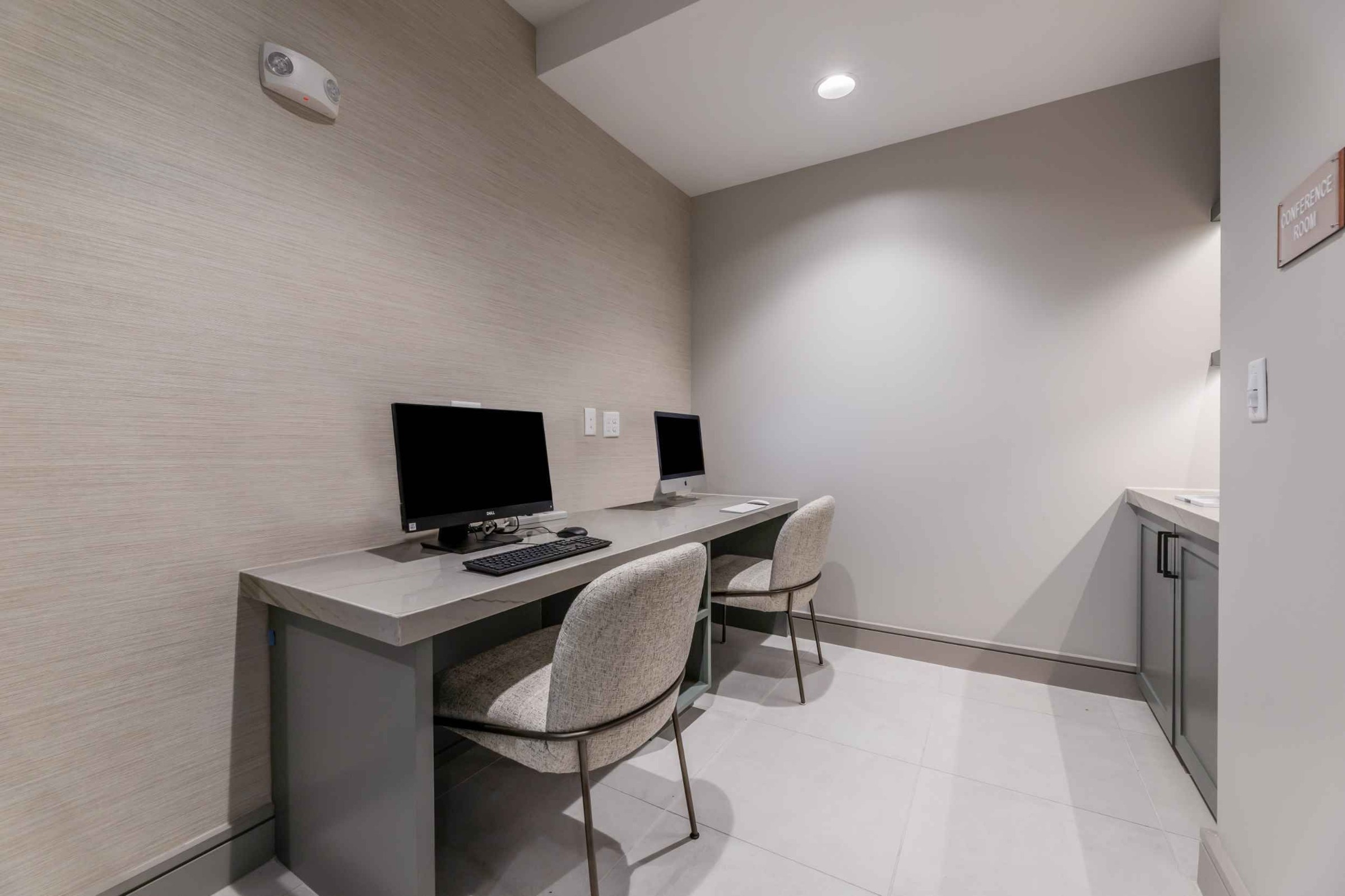 Atlas Crown - Private business center with two computers