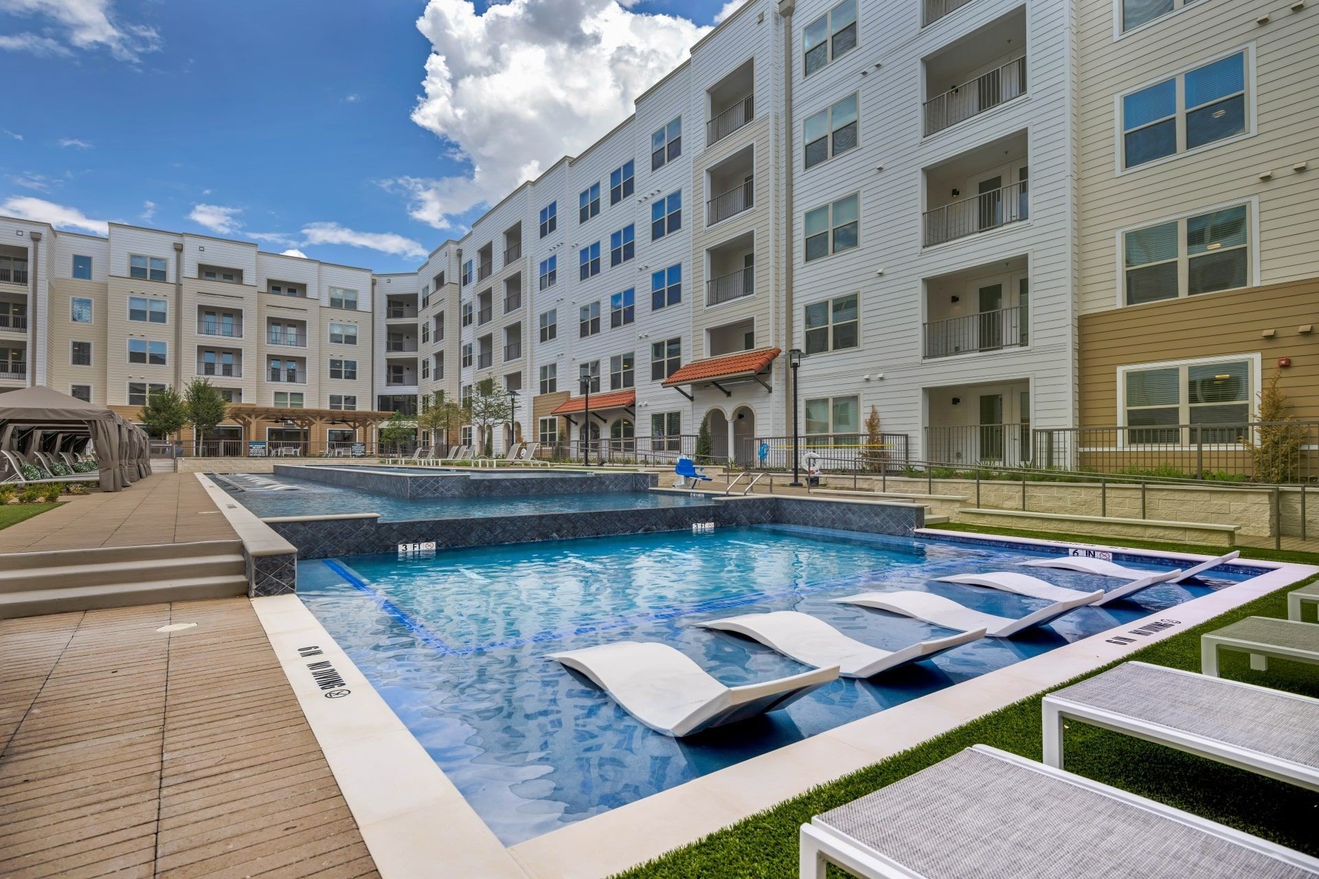 Ablon at Harbor Village - Swimming pool with sundeck, cabanas and lounge chairs