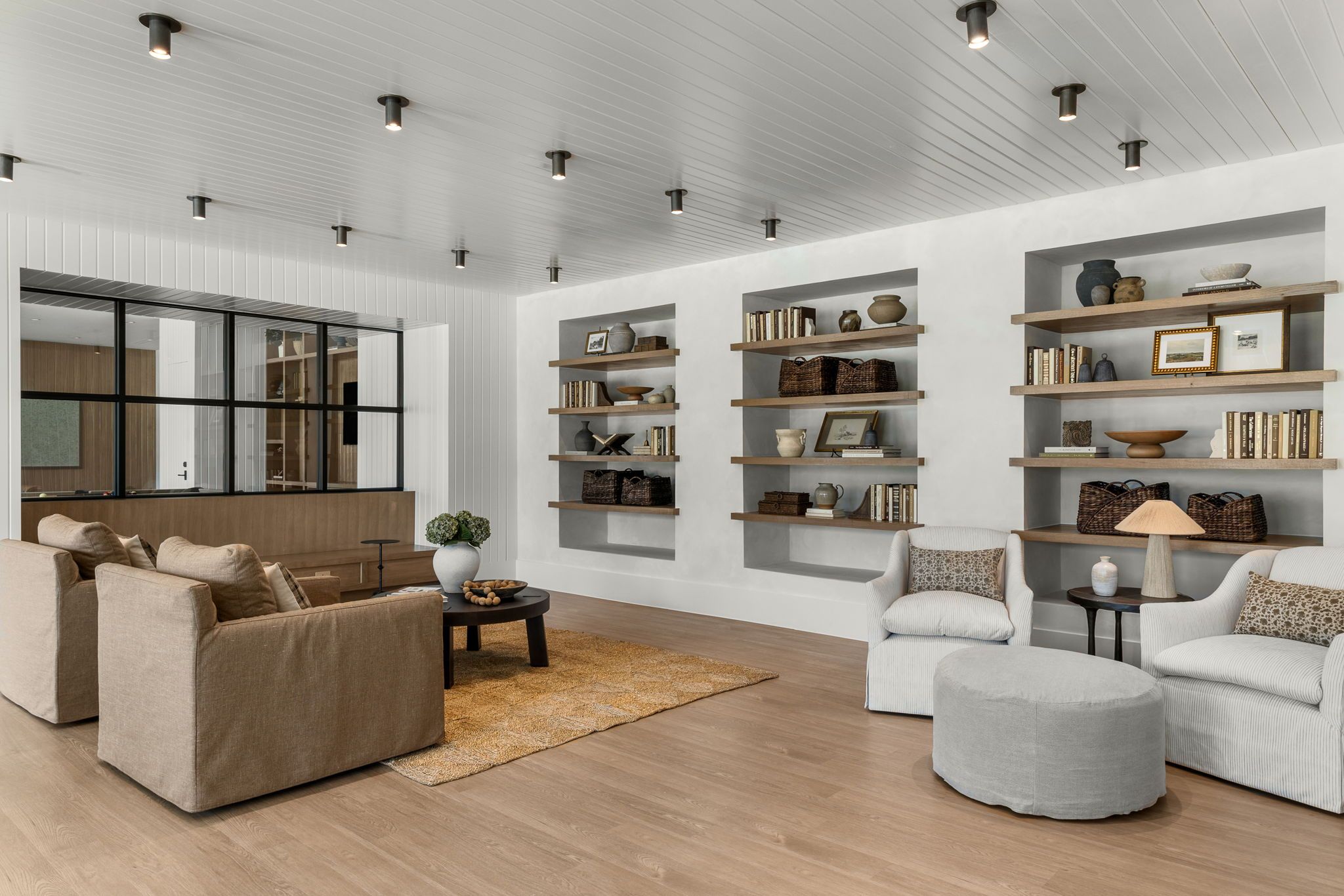 Resident library lounge with built-in bookshelves
