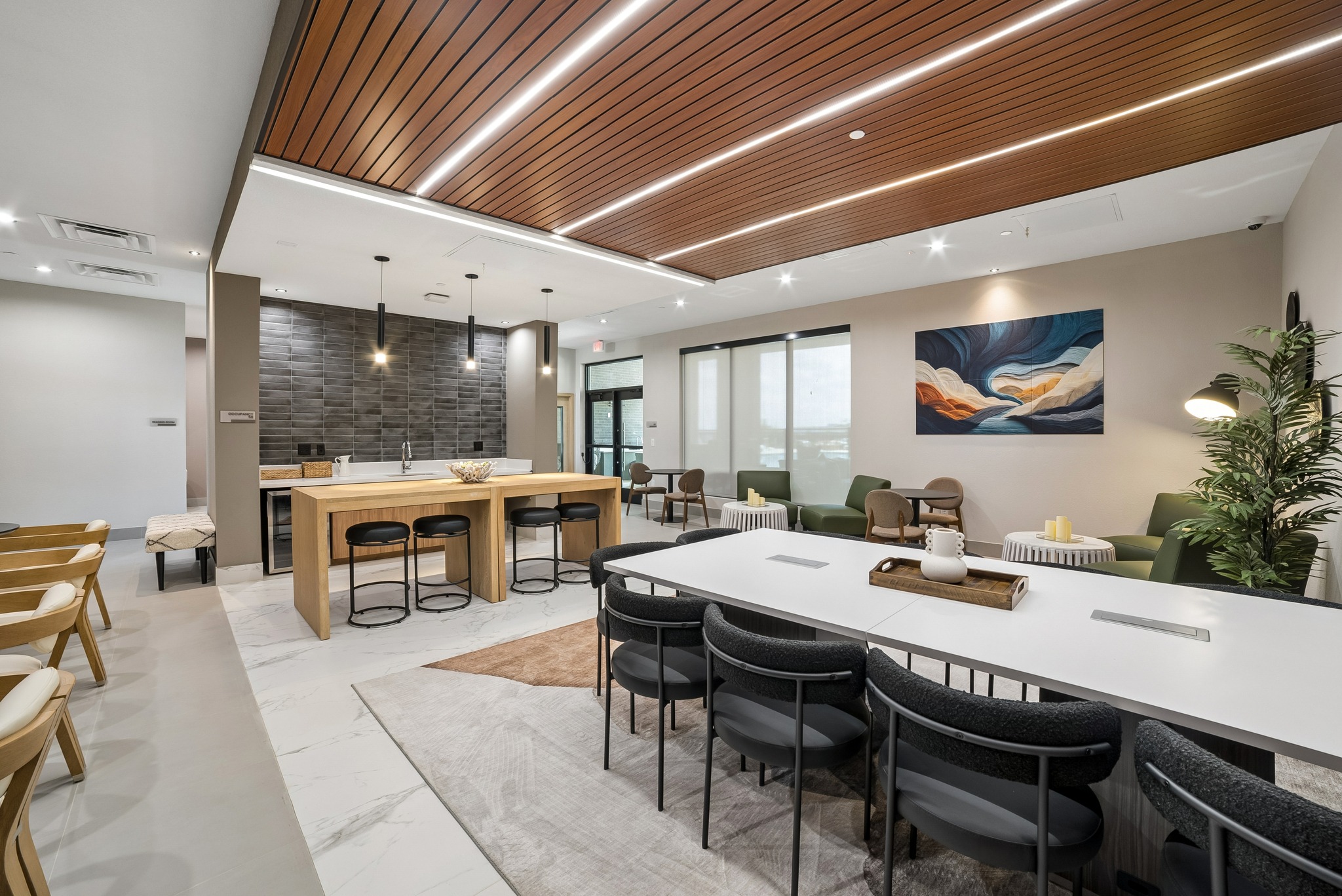 Resident clubhouse with long dining table