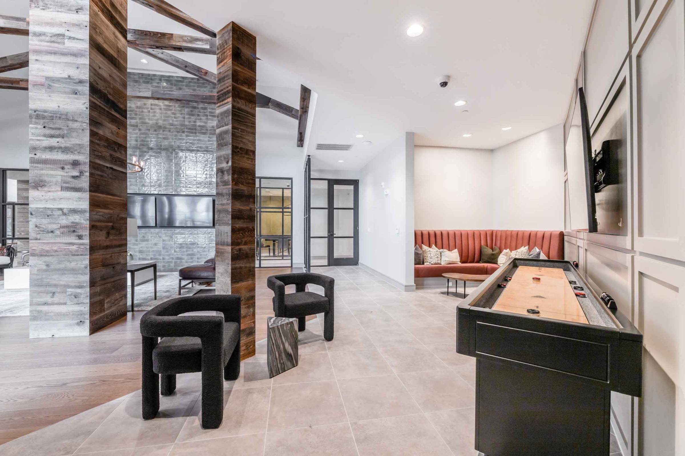 Atlas Crown - Clubhouse gaming area with lounge seating