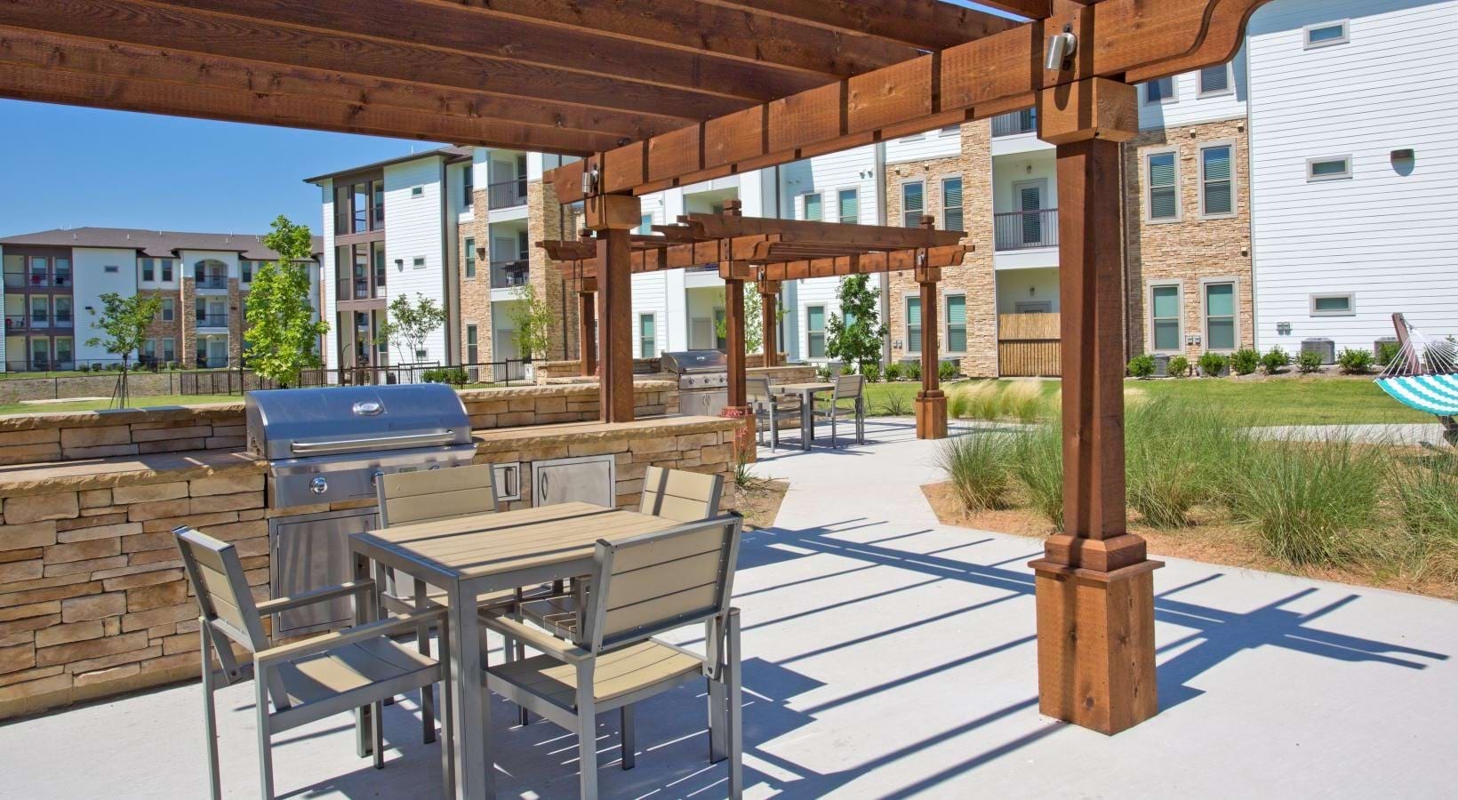 Covered grilling and dining pergola at Bellrock Upper North