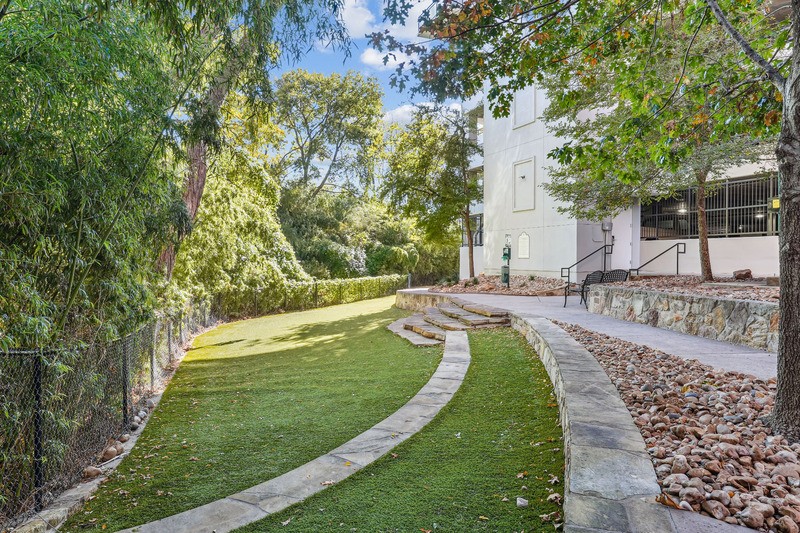 Cantabria at Turtle Creek - Landscaped green space and walking path