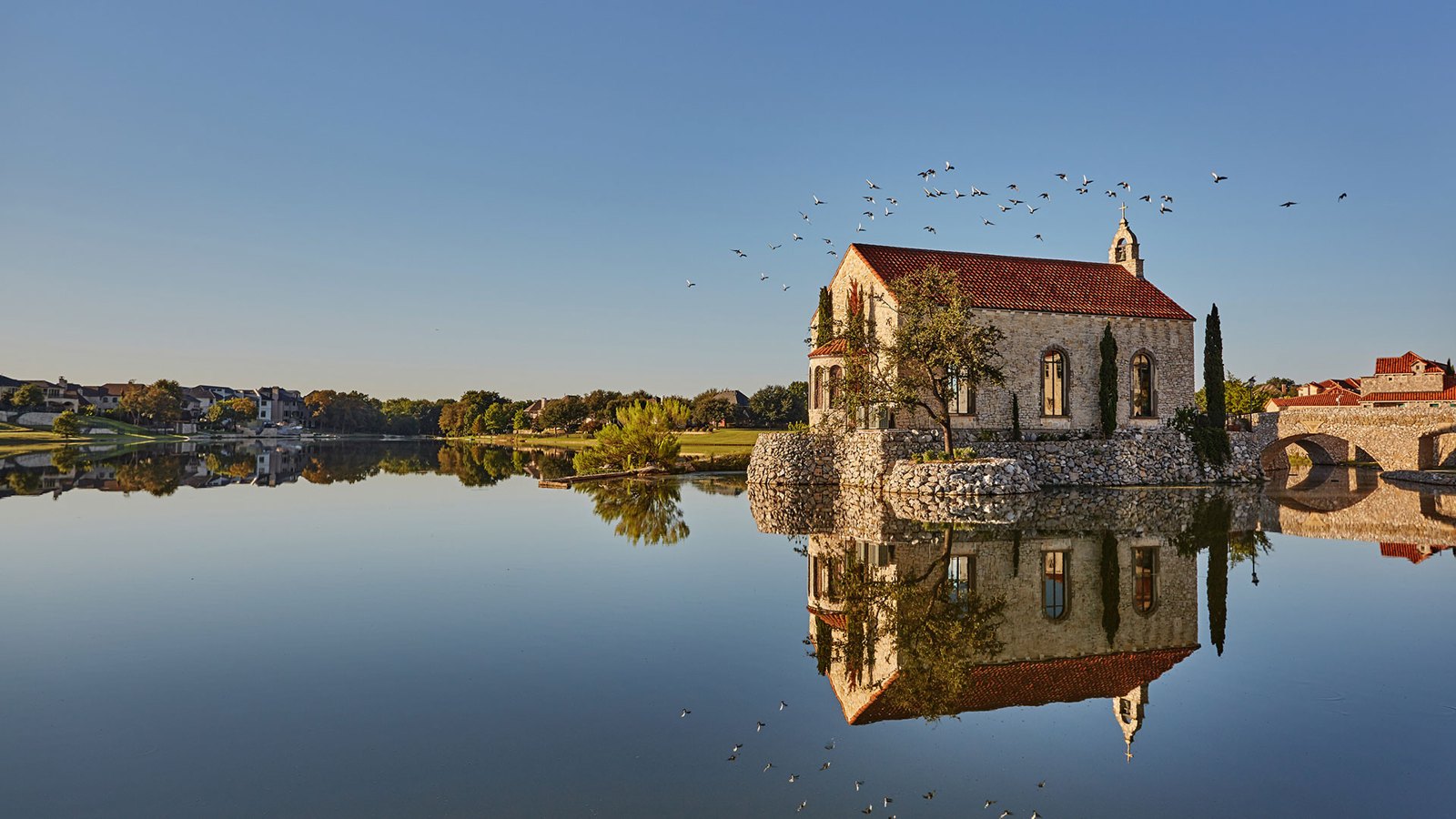 Looking across the lake at Bell Tower Reserve