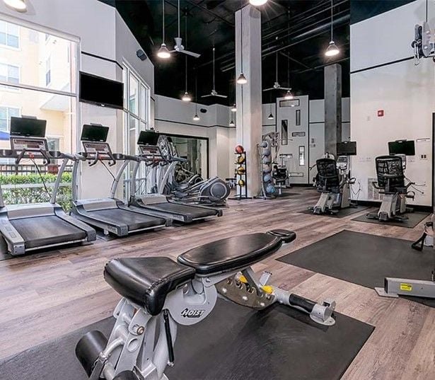 Brick Row Apartments - Apartments in Richardson, TX - fitness center at Brick Row Apartments
