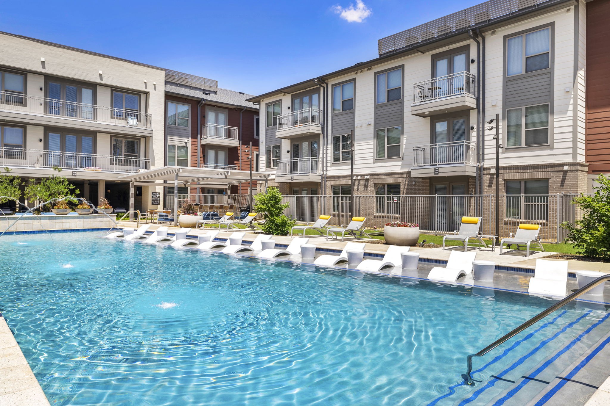 26 at City Point - A swimming pool in front of apartment buildings