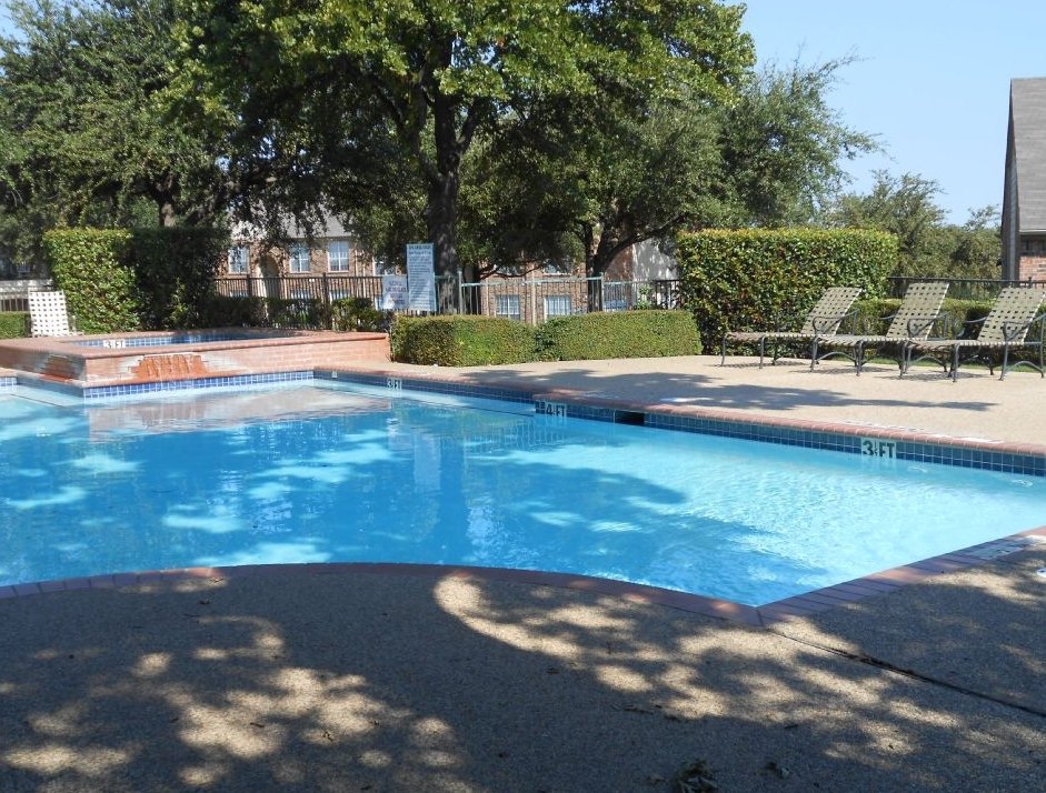 A rectangular pool with a depth of 3.5 feet. at Ash Lane Apartment Homes