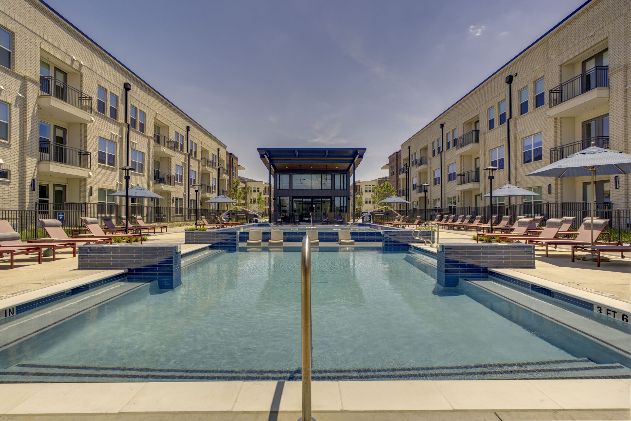 Resort-Style Pool with Sun Ledge at Village at Lexington Ranch
