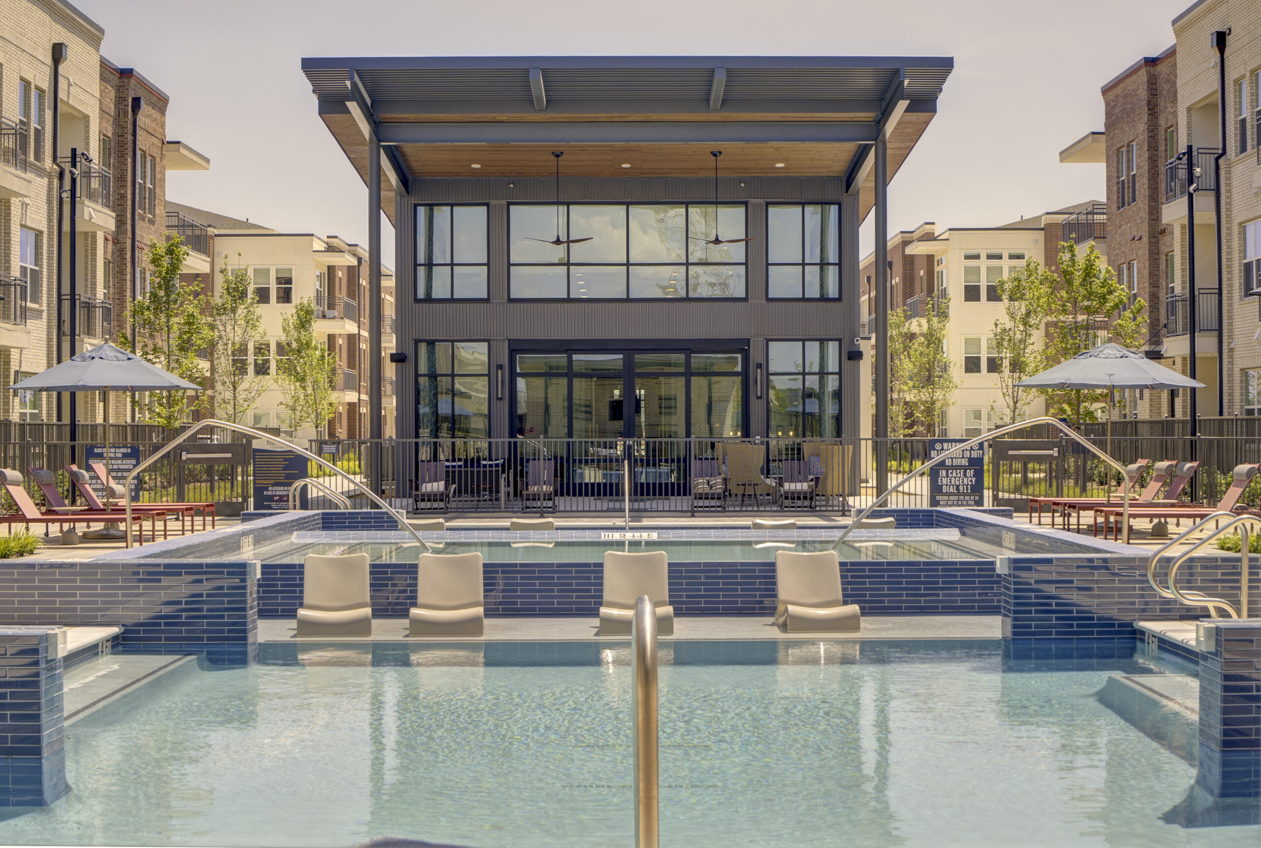 Resort-Style Pool with Sun Ledge at Village at Lexington Ranch