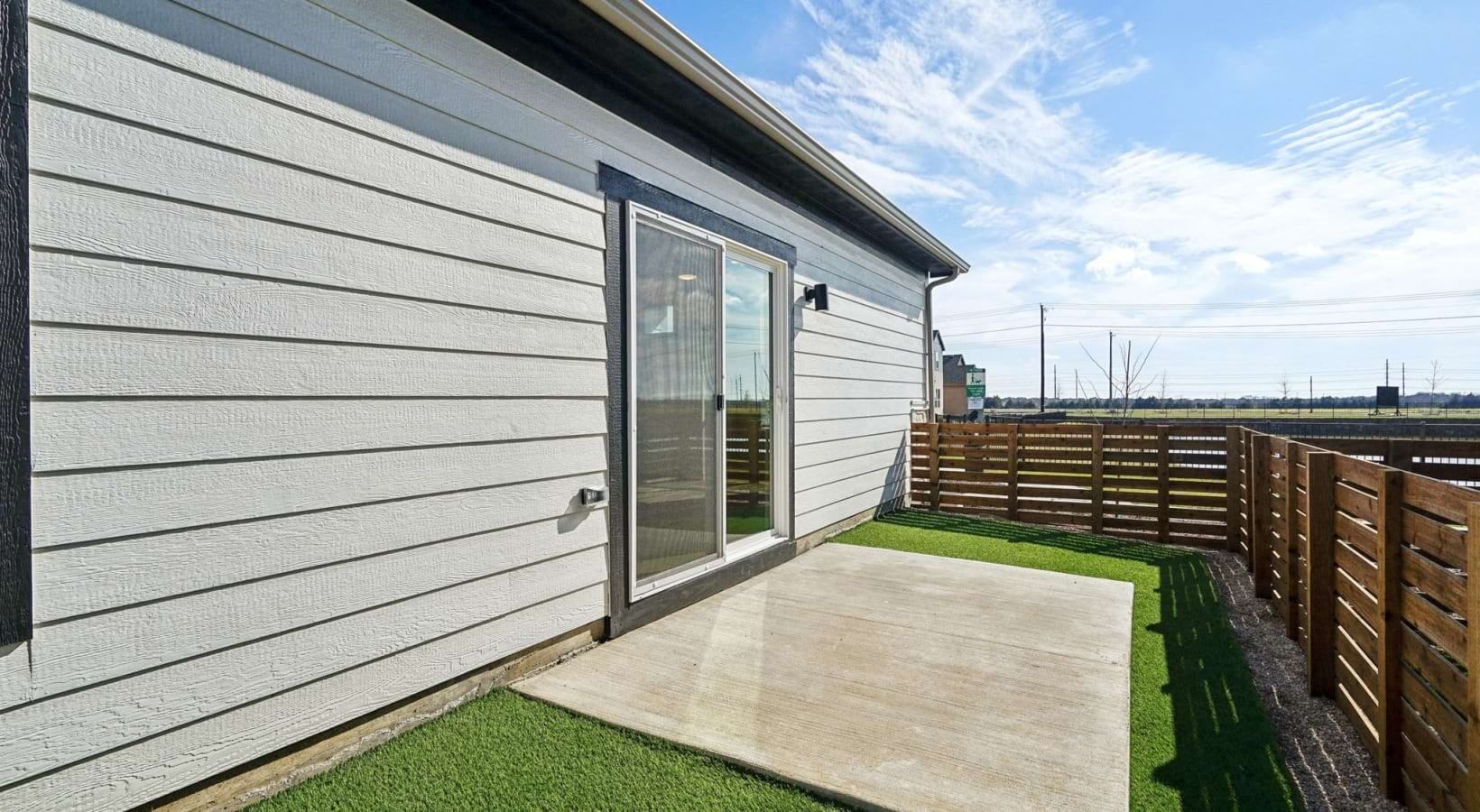 Canvas at Anna - Glenwood Floor Plan - Private, fenced-in side patio with artificial turf