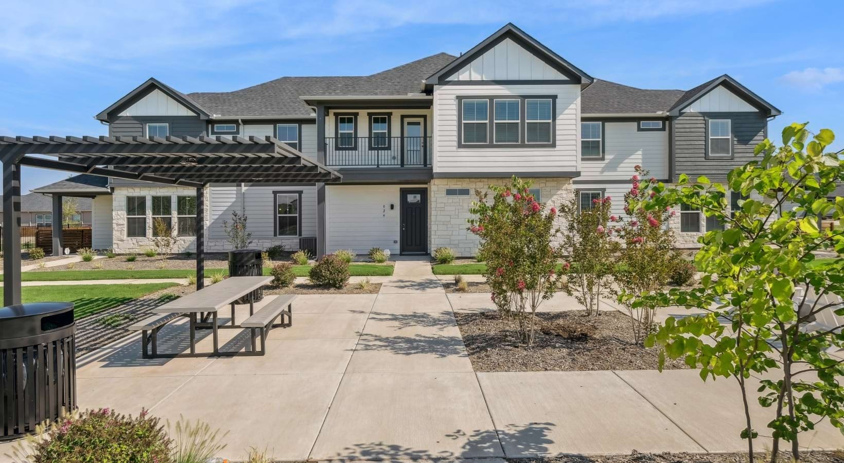 Canvas at Anna - Large, outdoor green space with firepit and benches