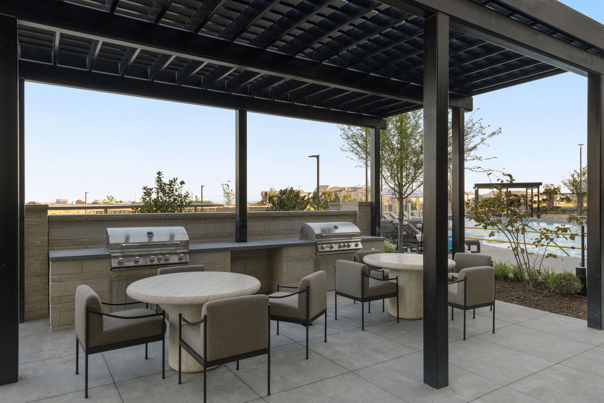 Outdoor grilling stations with social seating