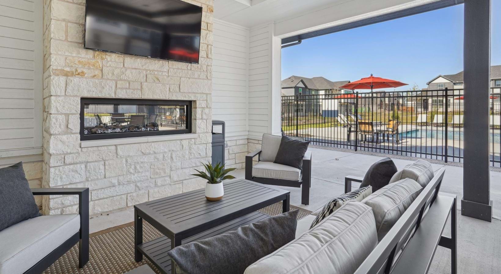 Canvas at Anna - Cozy outdoor fireplace and entertainment space