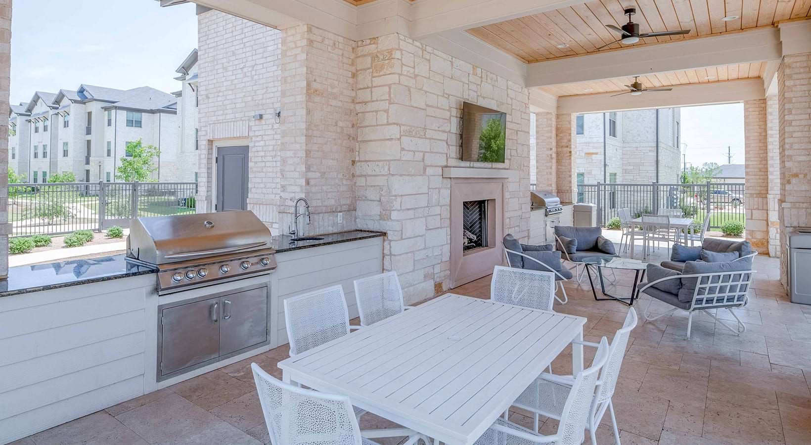 Outdoor grilling station and dining at The Beverley at Denton